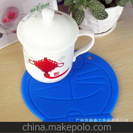 哆啦a夢機(jī)器貓隔熱餐墊 創(chuàng)意卡通叮當(dāng)貓隔熱墊 環(huán)保硅膠餐墊批發(fā)圖片